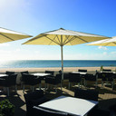 FJB Hotels sent this photo of their terrace over and mentioned that they serve pizza on the beach until 9:30pm