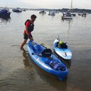Posted on the Friday Night paddle event August 7th. "Am just back from the Friday Night paddle - North Haven to Brownsea Pottery Pier then back via PYC. Just me, Biker Phil and his beard - he was on his one ton sit on, I was in the little blue squirly boat that so needs a skeg.  The water was glassy flat courtesy of negative wind strengths - we cruised past the Old Ferry that is now a fish processing plant - we could have circled the island and that would have been special but it was the first event this year so I played it safe. We left the beach after a BBQ a little after midnight - 6 hours on or by the water. It wasn't quite perfect as it was so noisy out there with jet skis and power boats but next time we will head around the back of the islands where that won't be a problem."