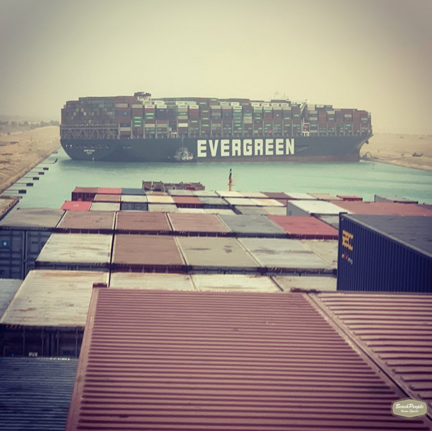 https://www.bbc.com/news/world-middle-east-56505413<br /><br />"Dozens of vessels are stuck after a giant container ship became wedged across Egypt's Suez Canal, one of the world's busiest trade routes.<br /><br />Rescue boats are working to free the 400m-long (1312ft) vessel, which was knocked off course by strong winds.<br /><br />Egypt says it has reopened the canal's older channel to divert traffic, amid fears it could remain blocked for days.<br /><br />The incident has already created long tailbacks on the waterway, stopping dozens of other vessels from passing.<br /><br />About 10% of global trade passes through the Suez Canal, which connects the Mediterranean to the Red Sea and provides the shortest sea link between Asia and Europe.<br /><br />The Ever Given, registered in Panama, was bound for the port city of Rotterdam in the Netherlands from China and was passing northwards through the canal on its way to the Mediterranean.<br /><br />The 200,000 tonne ship, built in 2018 and operated by Taiwanese transport company Evergreen Marine, ran aground and became lodged sideways across the waterway at about 07:40 local time (05:40 GMT) on Tuesday.<br /><br />At 400m long - the length of four football pitches - and 59m-wide, the ship has blocked the path of other vessels which are now trapped in lines in both directions.<br /><br />A tracking website, Vessel Finder, shows the build up of marine traffic on both the northern and southern sides of the blocked waterway. "<br /><br />https://www.fleetmon.com/maritime-news/2021/33105/mega-container-ship-hard-aground-suez-canal/<br /><br />..yup - pretty much no getting around that!